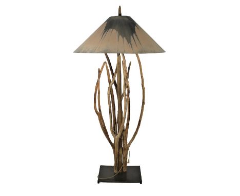 Unique floor lamp of driftwood, on metal base. Measurements: Lamp - 69 1/2 x 18 in. Please note that all sales are final and 