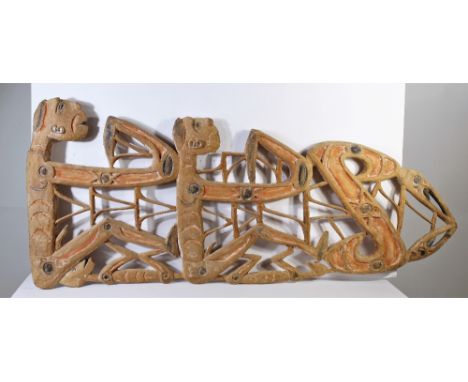 Polychrome wooden wall sculpture of men rowing. Size: 19 3/4 x 45 1/2 in. Please note that all sales are final and no refunds