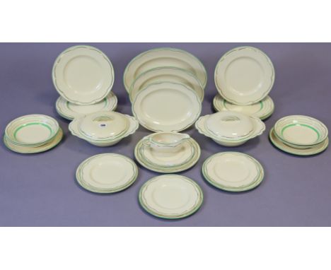 A Clarice Cliff thirty-one piece part dinner service of cream ground &amp; with green borders, part w.a.f. 