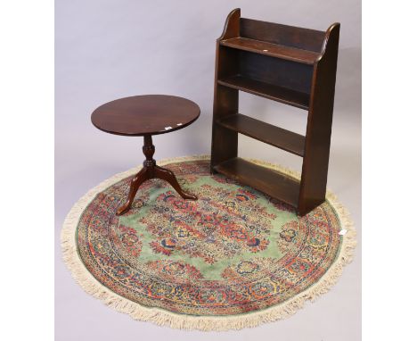 A mahogany tripod table with a circular top, &amp; on a vase-turned centre column &amp; three cabriole legs, 59cm diameter x 