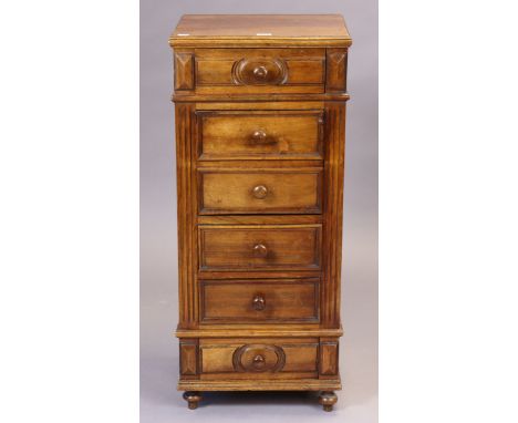 A continental-style walnut small upright cabinet fitted with an arrangement of four long drawers &amp; a fall-front, &amp; on