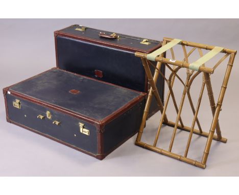 A simulated bamboo fold-away luggage-stand 45.5cm wide; &amp; a pair of fibre-covered travelling cases, 79.5cm wide. 