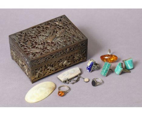 Seven dress rings; two brooches; &amp; an ornate metal jewellery box; 12.75cm wide.