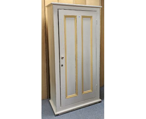 A white painted pine tall cupboard fitted four shelves enclosed by a panel door, &amp; on a plinth base, 88cm wide x 179cm hi