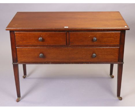 An Edwardian mahogany chest fitted two short &amp; one drawer, &amp; on square tapered legs with ceramic castors, 105.5cm wid