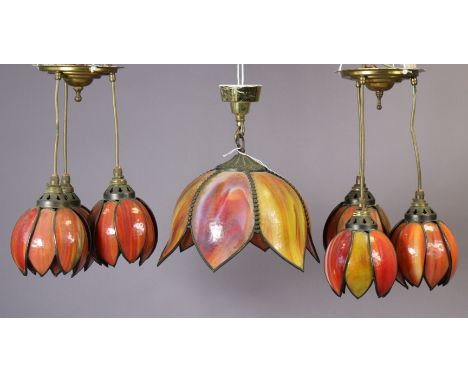 An orange mottled glass ceiling light fitting, 26cm diameter; &amp; a similar set of smaller ceiling light fittings, 12cm dia