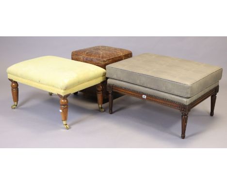A 19th century-style mahogany rectangular stool with a padded seat, &amp; on turned &amp; fluted tapering legs, 73cm wide x 4