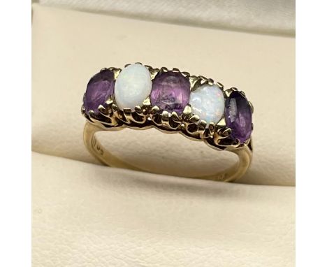 Amethyst and opal five stone ring, claw set in 9ct gold, pierced gallery, plain shank. [Ring size L] [2.71Grams] 