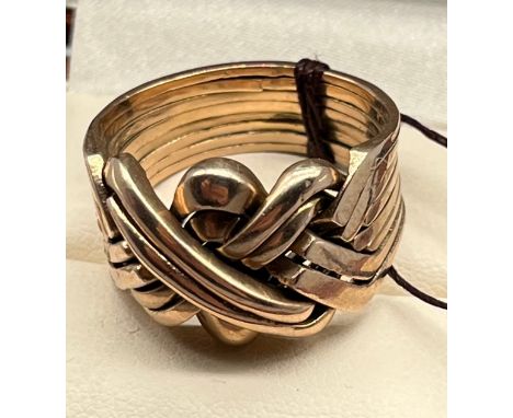 Heavy 9ct yellow gold gent's puzzle ring. [Ring size V] [13.71grams] [Marked rubbed] 