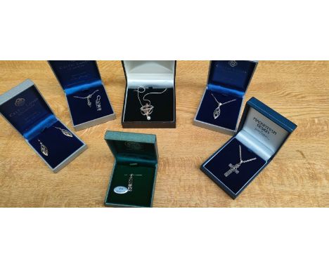 A Collection of Celtic/ Scottish design silver Jewellery; Celtic cross pendant with chain, Celtic pendant, chain with matchin