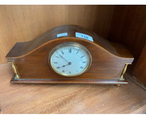 Antique French mantel clock, Mahogany body with brass designed columns and bun feet. Working 