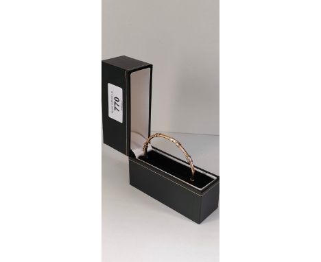 9ct two tone gold bangle. [6.86grams] 