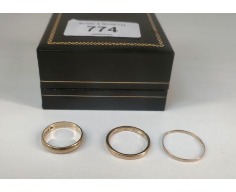 Three various gold wedding bands; 18ct yellow gold band- [Ring size N] [2.57Grams] and two 9ct yellow gold bands [M & Q] [2.4