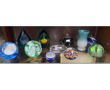 A Shelf of art glass paperweights; Perthshire cane paperweight, Strathearn paperweight, Caithness Evening Primrose, Dignity a