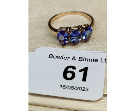 10ct yellow gold ladies ring set with three pear drop cut gem stones. [Ring size P] [2.25Grams] 