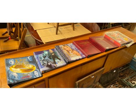 A Collection of binders containing collectable trading cards; Buffy the vampire card sets, The Crow, X-men, Dare Devil, Lord 