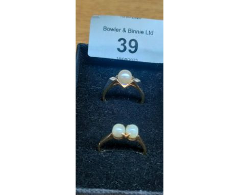 Two 9ct yellow gold rings fitted with pearls; One ring fitted with a single pearl and off set by single diamonds to each shou