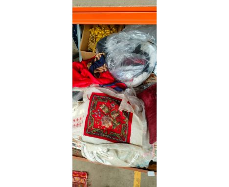 A Large quantity of mixed upholstery material, curtains and cushions 