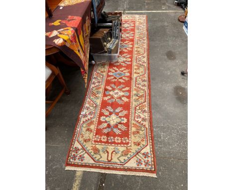 Ornate Aztec style hall runner rug. 