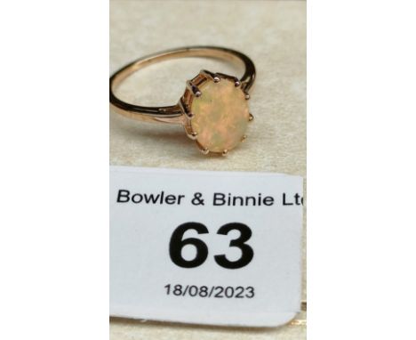 10ct yellow gold ladies ring set with a single Ethiopian opal stone. [Ring size R] [2.46Grams] 