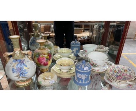 Shelf of porcelain collectables; Royal Worcester bottle neck and bulbous ornate vase, Royal Worcester rose design vase, Parag