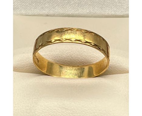 18ct yellow gold wedding band. [Ring size V] [2.78Grams] 