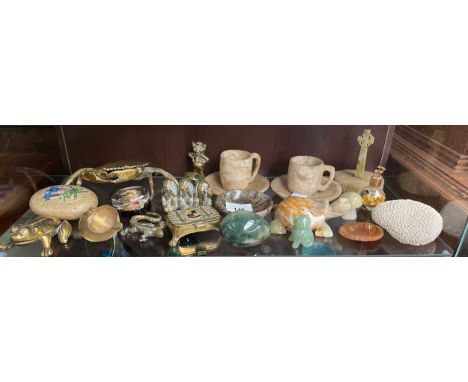 A Shelf of collectables; Jade carved cat figure, Brass crab sculpture, Coral, onyx and carved stone items, Genuine Gold leaf 