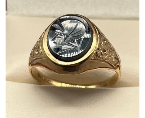 9ct yellow gold gents signet ring, engraved centurion stone. [Ring size S] [4.19Grams] 