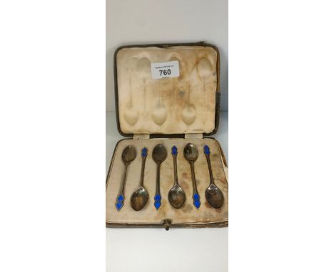 Boxed set of six Sheffield silver and enamel tea spoons. 