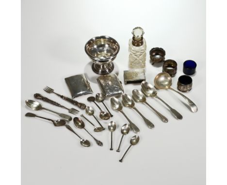 A collection of silver items, comprising; a small bowl; a silver mounted glass scent bottle; two cigarette cases; a matchbox 