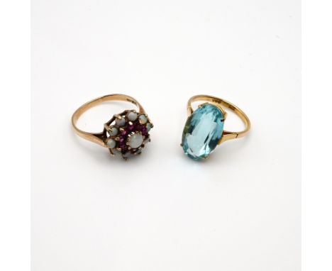 A 9 carat gold opal and garnet cluster ring; with a single stone dress ring, stamped &lsquo;375; 6.5 grams gross.