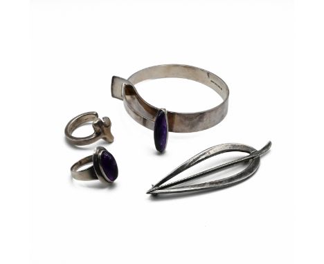 A Kupittaan Kulta amethyst set bangle, stamped marks; an N E From amethyst ring; a Just Andersen stylised leaf brooch; and a 