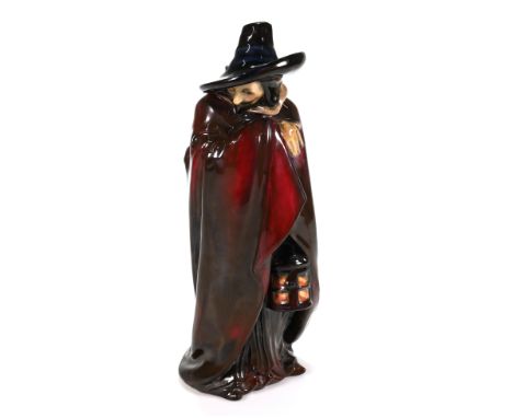 "Guy Fawkes" figurine bearing the signature "Charles Noke Sc" and the painted words "Potted by Doulton &amp; Co" and also the