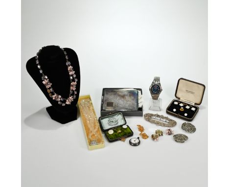 A collection of costume jewellery to include a Victorian silver buckle, two boxed sets of studs and cufflinks with mother of 