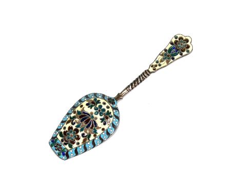 A Russian silver and enamelled sugar spoon, with 84 zolotnik mark only, the shovel bowl with plique a jour enamel, 13.5cm lon