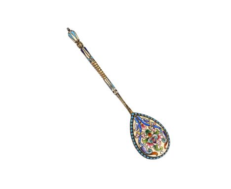 A Russian silver gilt and enamel spoon, with pre-1908 Kokoshnik mark, makers mark ‘MC”?, enamelled to the stem and reverse of
