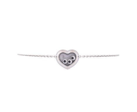 CHOPARD Armband "Happy Diamonds" mit 3 Brillanten von zus. ca. 0,09ct mit guter Farbe und Reinheit. WG 18K, 5,8 gr. Länge ca.