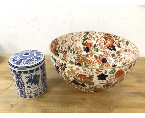 A Dutch blue and white sugar lidded canister, inscribed to base Heinneken Delft Holland, (12cm h) and a Royal Cauldron bowl (