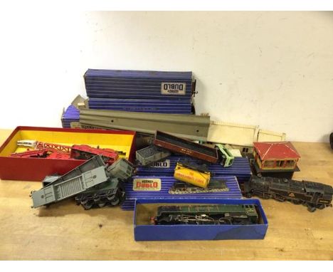 Train Interest:- A collection of Hornby Duplo including Duchess of Montrose engine, an engine, other carriages, buildings, tr