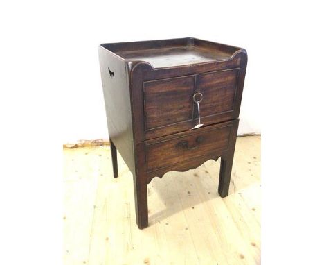 A 19thc commode the galleried top with pierced handles to sides above two doors opening to recess above drawer which pulls al