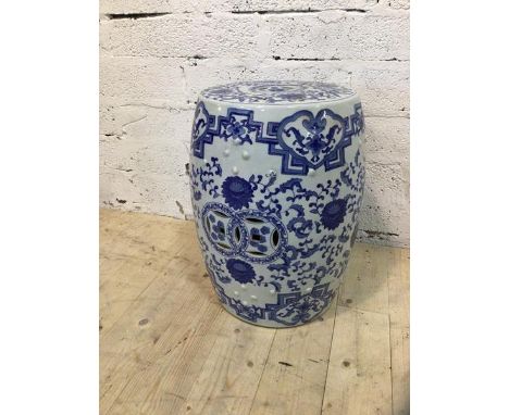 A blue and white ceramic chinoiserie design garden stool, (47cm x 34cm )