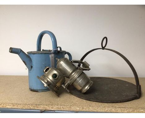 A mixed lot including griddle (22cm x 31cm), a vintage lamp inscribed Joseph Lucas Ltd, Birmingham, an enamel watering can (3