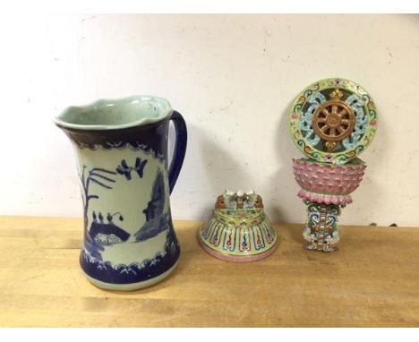 A Chinese Buddhist alter ornament with red seal mark a/f and a blue and white Chinese water jug with blue seal mark to base (
