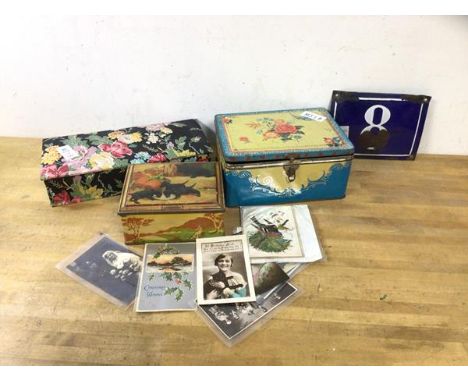 A mixed lot including vintage tins, (largest 11cm x 25cm x 19cm), an enamel house number sign, vintage postcards etc (a lot)