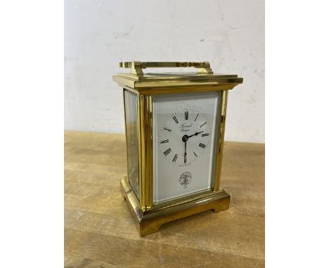A brass and glass carriage clock, the dial inscribed Forrest, Glasgow with Glasgow Golf Club logo to base, (15cm h including 