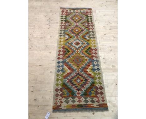 A Kobi Kelim runner of all over geometric design (190cm x 65cm)