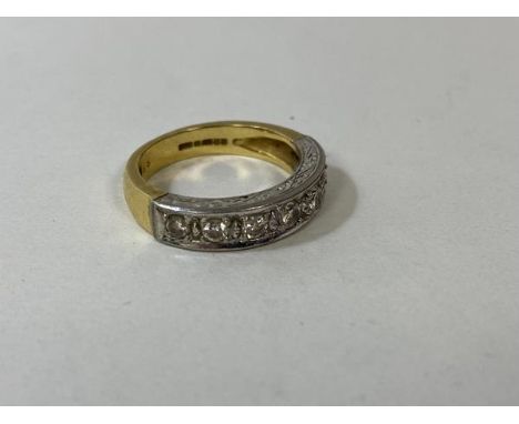 A gold half eternity ring with seven diamonds, size N, weighs 6.82 grammes