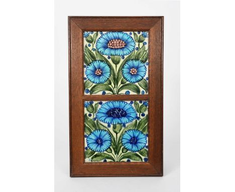 A pair of William De Morgan Bedford Park Daisy tiles, painted in shades of blue, green and aubergine on a white ground, frame