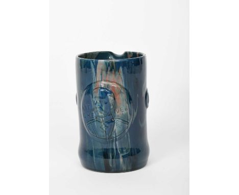 A Sunflower Pottery Commemorative mug by Sir Edmund Elton, dated 1916, cylindrical with cast portrait of Kitchener, covered i