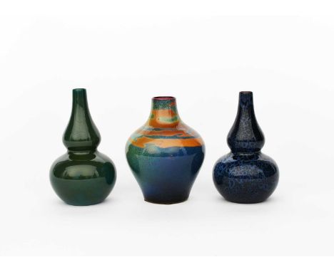 A Royal Doulton Titanian Ware vase, double gourd form covered in a green and blue glaze, another Royal Doulton Flambe double 